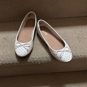 Brash White Flats with Bow and Perforated Design